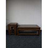 An oak two tier coffee table and matching lamp table