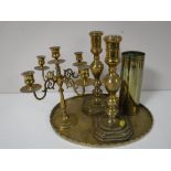 A brass serving tray, together with a brass five way table candelabra,