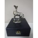A sterling silver John Pinches figure - 'Playing up', boxed.