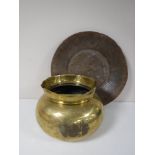 A large antique copper bowl,