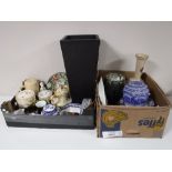 Two boxes containing blue and white dinnerware, Ringtons caddie, hand painted glass vase,