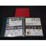 Four albums containing first day covers