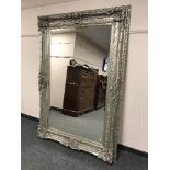 A Victorian style silvered mirror,