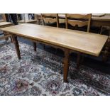 A mid 20th century blonde oak refectory coffee table