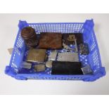 A basket of smoking related items including vesta cases, cigarette cases,