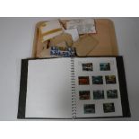 A collection of stamps, stamp albums etc.