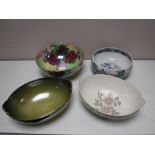 A tray of four Maling bowls CONDITION REPORT: Olive-coloured lustre bowl with