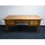 A pine kneehole writing desk,