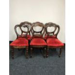 A set of six Victorian balloon back dining chairs