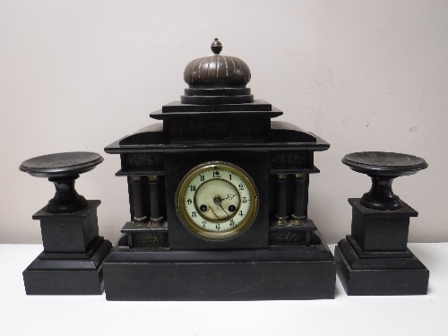 A three piece black slate clock garniture (3)