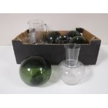 A box containing four green glass hand blown balls, together with an etched glass decanter,
