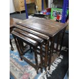 A nest of four Eastern brass inlaid tables