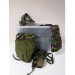 Two boxes containing military uniforms, mats,