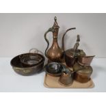 A tray containing an Eastern brass and copper tea pot, antique copper kettle,