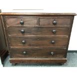 A Victorian pine five drawer chest