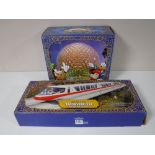 A boxed Walt Disney World Monorail and Spaceship Earth accessory (2)