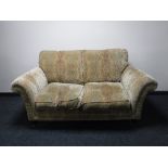 A Parker Knoll two seater settee in a floral fabric
