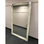 A cream framed over mantle mirror, 90cm x 151cm