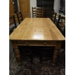 A pine farmhouse kitchen table,