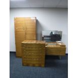 A mid twentieth century walnut three piece bedroom suite