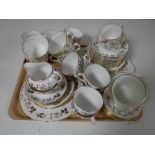 A tray containing thirty three pieces of Minton Fragrance tea china,
