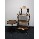 A mahogany gilded four tier what not stand and a mahogany wine table