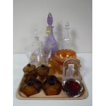 A tray of assorted glassware including etched decanters and goblets, part smoked glass trinket set,