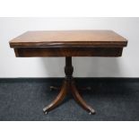 A mahogany pedestal TOT tea table