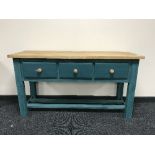 A painted pine kitchen three drawer preparation table