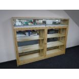 A bespoke built double door display cabinet