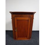 A Victorian mahogany hanging corner cupboard