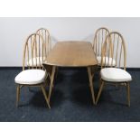 An Ercol elm drop leaf table,