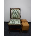 A bedroom chair and a concertina sewing box