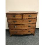 A Victorian mahogany five drawer bow fronted chest,