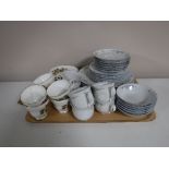 A tray containing a West German tea and dinner service,