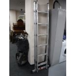 A set of aluminium extending ladders