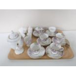 A tray containing a fifteen piece Royal Standard Wistaria tea service,