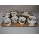 A twenty one piece Royal Albert Old Country Roses tea service with a Royal Albert Celebration of