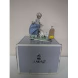 A boxed Lladro figure,