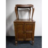 An oak gramophone cabinet together with a tapestry upholstered stool