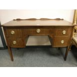 An Edwardian inlaid mahogany dressing table,