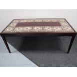 A rosewood tiled coffee table