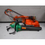 A Flymo electric strimmer and mower together with a garden vac and boxed hammock