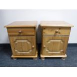 A pair of pine bedside cabinets fitted with a drawer