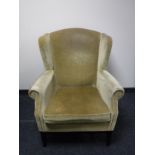 A mid twentieth century fireside armchair,