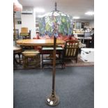 A Tiffany style standard lamp with shade