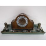 A walnut cased mantel clock,