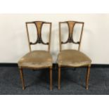 A pair of Victorian inlaid mahogany bedroom chairs