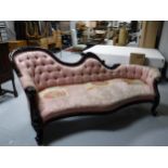 A mahogany framed chaise longue