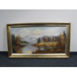 An ornate gilt framed oil on canvas - Dwelling in a mountainous landscape